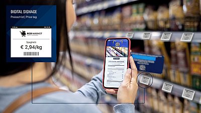 Shopper scans a digital price tag in a supermarket with a smartphone.