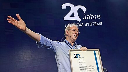 Founder Ralf Koenzen Receives the “20 Years of LANCOM” Certificate